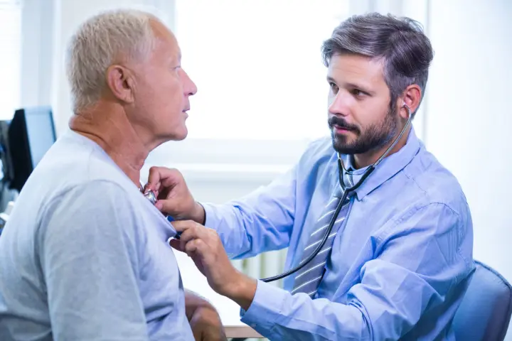 Strategic Growth AI: Helping Bring Rare Disease Treatments to Patients Successfully Doctor assisting a patient, symbolizing Strategic Growth AI's role in successfully commercializing rare disease drugs and supporting patient care